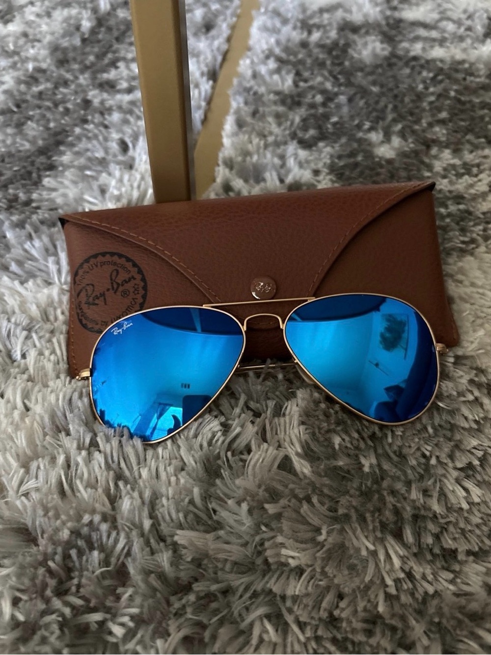 Ray-Ban Women's Gold Frame Aviator Sunglasses with Blue Mirrored Lenses